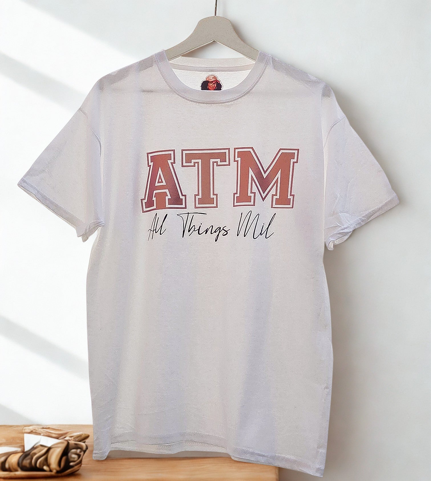 ATM Signature Logo Tee — The Essence of Mil (white)
